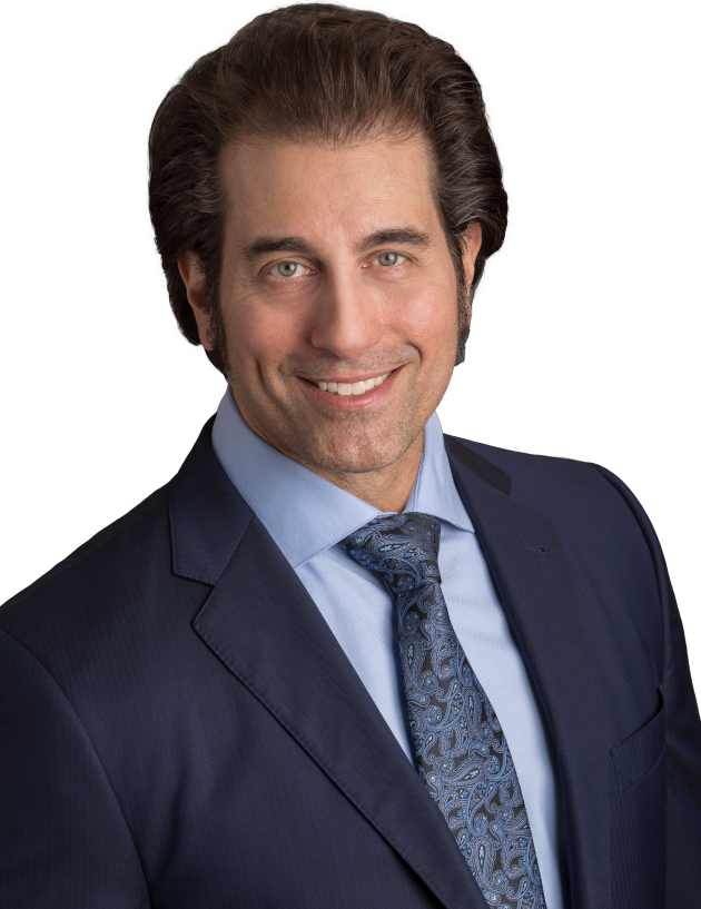 Photo of Las Vegas Real Estate Agent Tony Ranaudo in a blue suit and tie