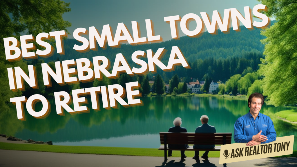 best small towns in Nebraska to retire ask realtor tony. senior man and woman sitting on a bench in front of a lake with hills full of green trees in the background